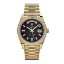 Rolex Day-Date 40 228398TBR Yellow Gold Onyx Baguette Diamond Dial Baguette Bezel